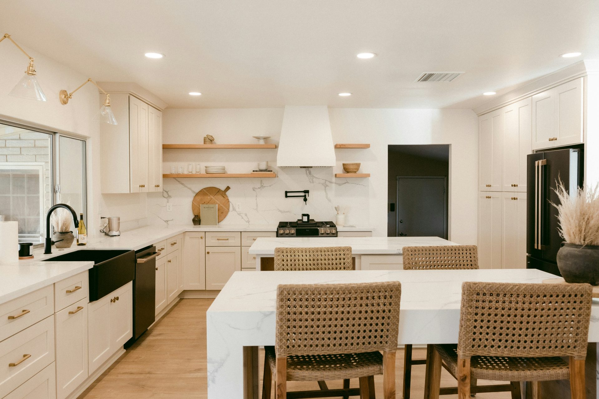 modern kitchen with woven rattan bar stools