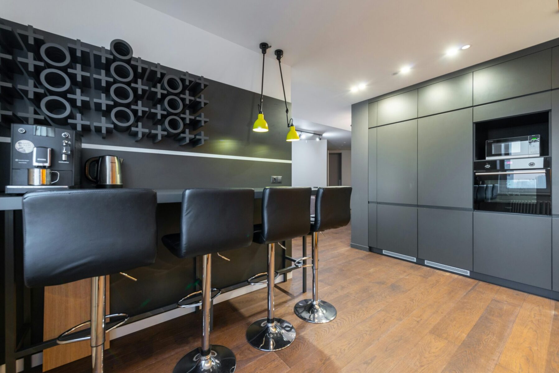 home bar stools and a coffee machine