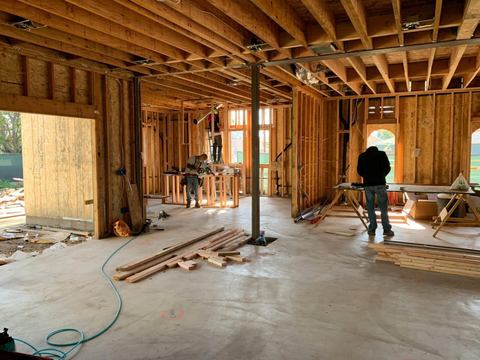 builders working on a home addition