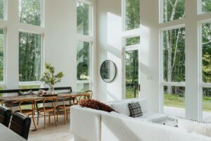 a living room with large windows