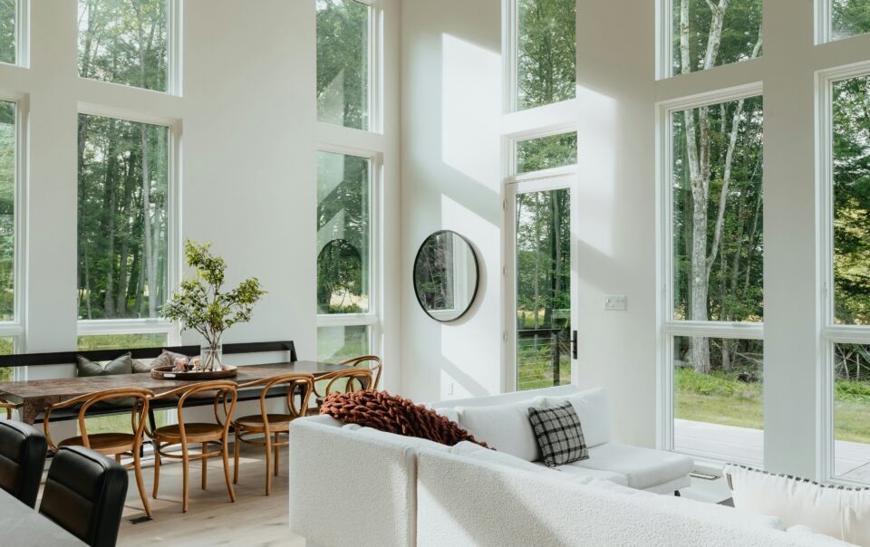 a living room with large windows