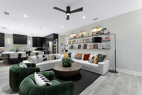 Open-concept living room and kitchen created through a comprehensive full home remodeling project