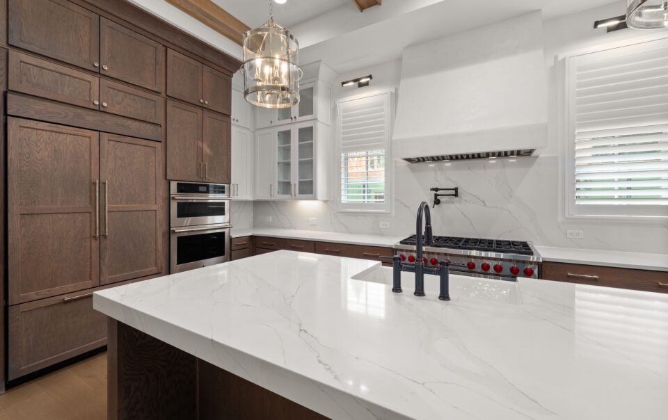 A modern kitchen with wooden cabinets